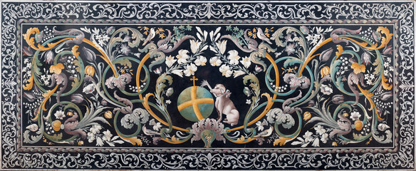 PERUGIA, ITALY - MAY 15, 2024: The stone baroque mosaic (pietra dura) on the side altar (palioto)...