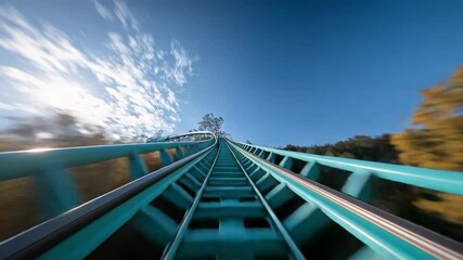 Intense first-person view of a roller coaster on a sunny day, evoking thrills and excitement.
