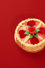 Delicious cake decorated with hearts and rose for valentine's day