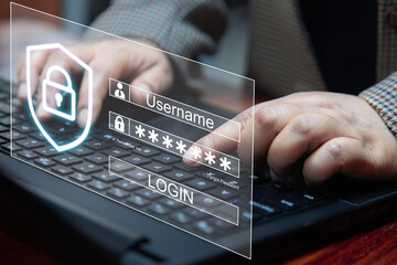 A user types login credentials on a laptop with an overlaid secure login interface featuring...