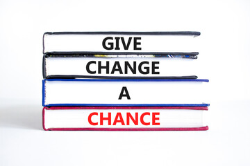 Give change a chance symbol. Concept words phrase Give change a chance on beautiful books....