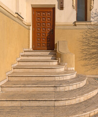 Round Stairs Structure Made From Stone House Entrance at Sunny Day