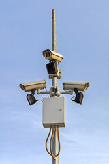 Three CCTV Security Cameras at Pole Surveillance System for Town Centre
