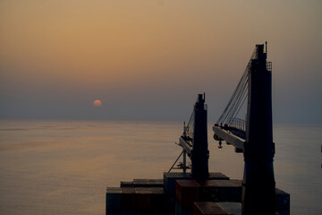 Container ship underway at sea in the morning