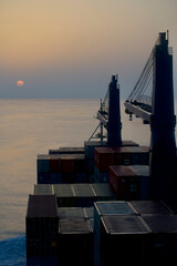 Container ship underway at sea in the morning