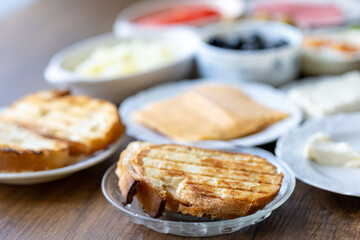 Turkish style breakfast: eggs, chechil cheese, white cheese, kashar cheese and Turkish tea