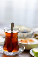turkish cup of tea with breakfast teapot	