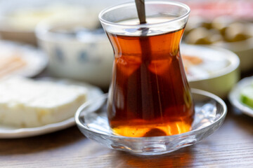 turkish cup of tea with breakfast teapot	