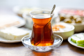 turkish cup of tea with breakfast teapot	