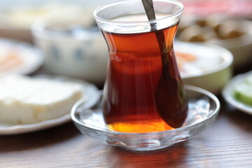 turkish cup of tea with breakfast teapot	