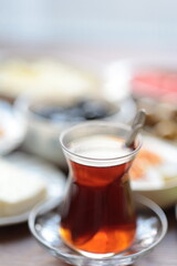 Turkish style breakfast: eggs, chechil cheese, white cheese, kashar cheese and Turkish tea