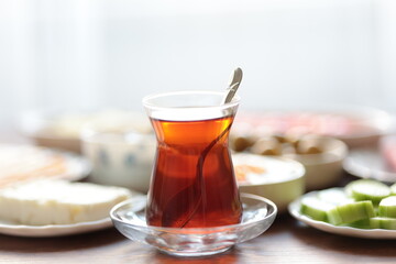 Turkish style breakfast: eggs, chechil cheese, white cheese, kashar cheese and Turkish tea
