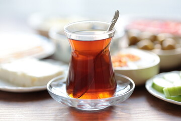 Turkish style breakfast: eggs, chechil cheese, white cheese, kashar cheese and Turkish tea
