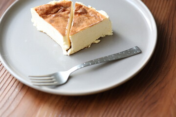 San Sebastian cheesecake on plate in restaurant in close-up	