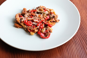 Close-up Asian style mushroom dish with sesame seeds