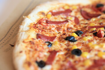 market pizza with salami and olives