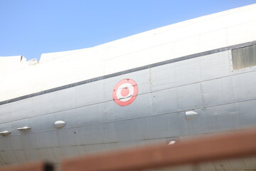 close up of a blue sky old war airplane