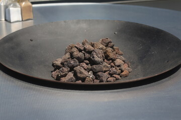coal in a round brazier close up