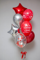 set of red and silver helium balloons for the holiday