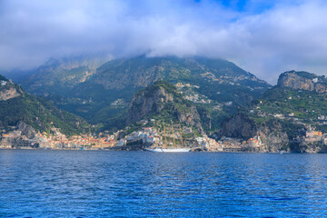 Amalfi Coast: Amalfi and Atrani townscape from sea, Italy.