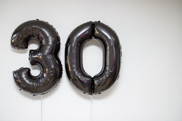 black foil numbers 30 helium balloons for 30 years