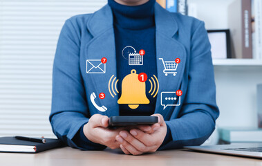 Notification Alert and Digital Communication Concept. Businessperson checks smartphone with...
