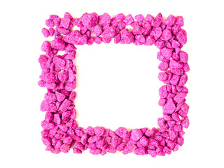 Square frame made of purple small stones rocks on white background. Copy space.
