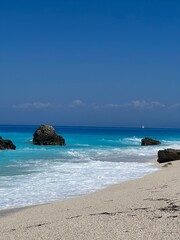 Foamy Waves and Coastal Rocks