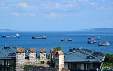 View of Yedikule Walls in Istanbul, Turkey with ships waiting in line in the background