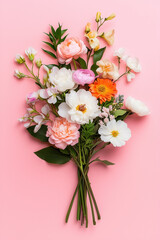 Fresh flowers arranged in a minimalist bouquet with vibrant colors on a soft pink background. Concept of floral design, gift giving, event planning