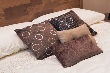 Beautiful pillows in a cozy bedroom