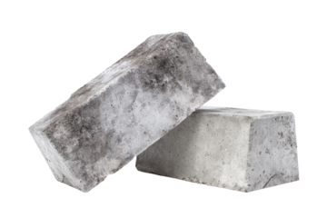 Two gray bricks are laying on top of each other