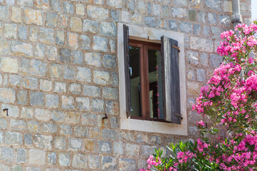 Old stone houses in Petrovac Montenegro, a resort town located on the coast of the Adriatic Sea in Montenegro, closeup