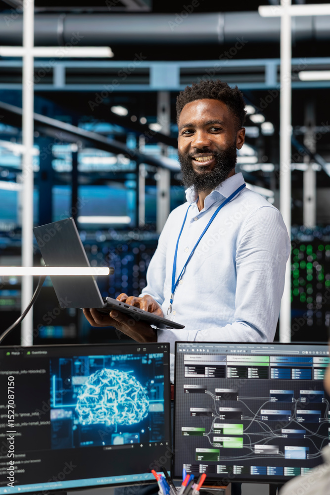 Poster cheerful man in server hub facility using artificial intelligence to perform demanding computing tas