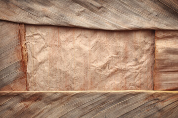 Textured background of dried banana leaves creates rustic and natural frame, showcasing intricate patterns and earthy tones of material