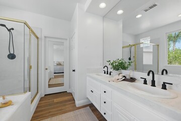 Elegant White Bathroom with Gold Accents