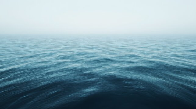 Calm, flat water surface in a muted blue tone.