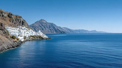 Picturesque white buildings clinging to a coastal cliffside, overlooking a calm body of water.