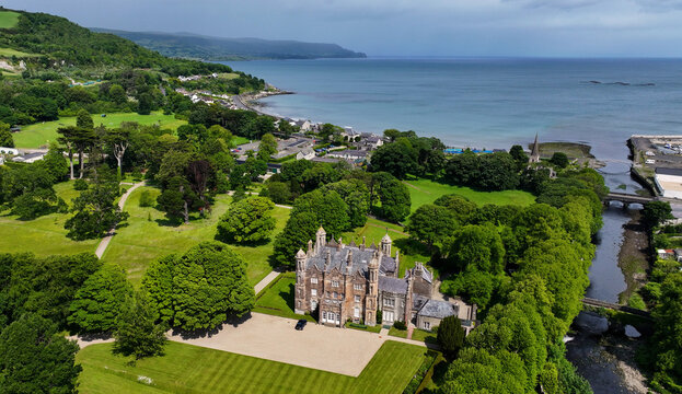 Aerial view of Glenarm Castle and Barbican Gate Co Antrim Northern Ireland on a sunny day 07-07-25