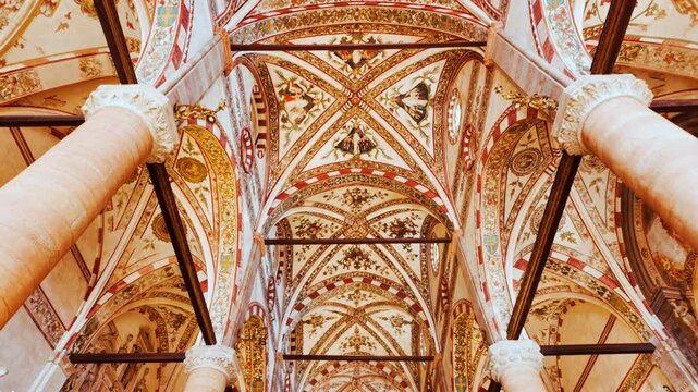 Interior of Basilica di San Zeno Maggiore highlights gilded altarpieces and patterned floor tiles beneath ribbed vaults, Verona, Veneto, Italy