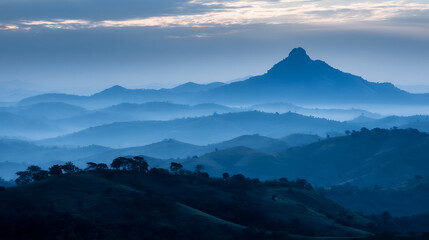 Naklejka premium The mountains are covered in trees and the sky is a deep blue