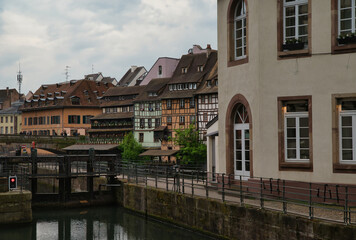 Fototapeta premium Romantic half-timbered houses from the 16th and 17th centuries, on the banks of the river III (tributary of the Rhine) in the center of Strasbourg, La petite France.