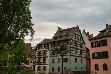 Naklejka premium Romantic half-timbered houses from the 16th and 17th centuries, on the banks of the river III (tributary of the Rhine) in the center of Strasbourg, La petite France.