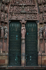 Detailed view of the door and sculptures of the Notre-Dame de Strasbourg cathedral, a masterpiece...