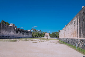 Chichen Itza, Mexico, 2019. The Grand Ball Court, the largest field in Mayan Mesoamerica. with ball players along the interior walls, used for ball games, ceremonial and religious human sacrifices. 