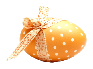 Decorative orange easter egg with ribbon indoor setting product close-up view cut out on transparent background