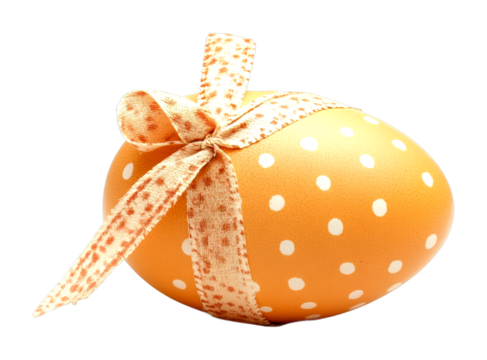 Decorative orange easter egg with ribbon indoor setting product close-up view cut out on transparent background