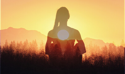 Thoughtful calm happy free woman enjoys a beautiful moment life relaxing looking at the sunset, mind body spirit concept, double exposure 