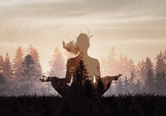 Meditate. Woman meditating in nature forrest at sunrise for inner peace
