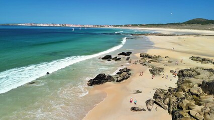 A beautiful tropical beach with clear turquoise water and soft white sand, ideal for relaxation